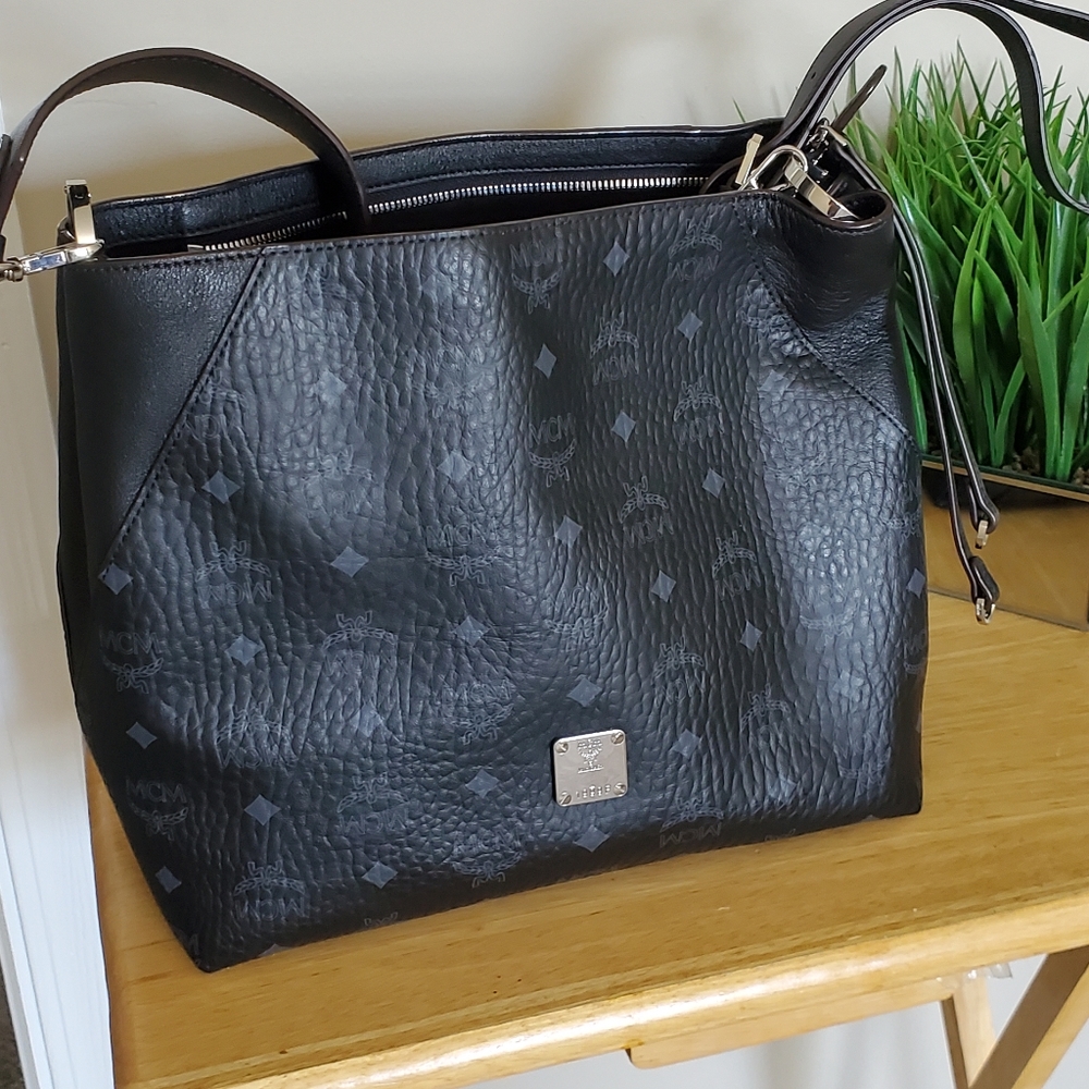 MCM bag! Brand new! Carried once. Too big for me. Comes with strap and dust bag.